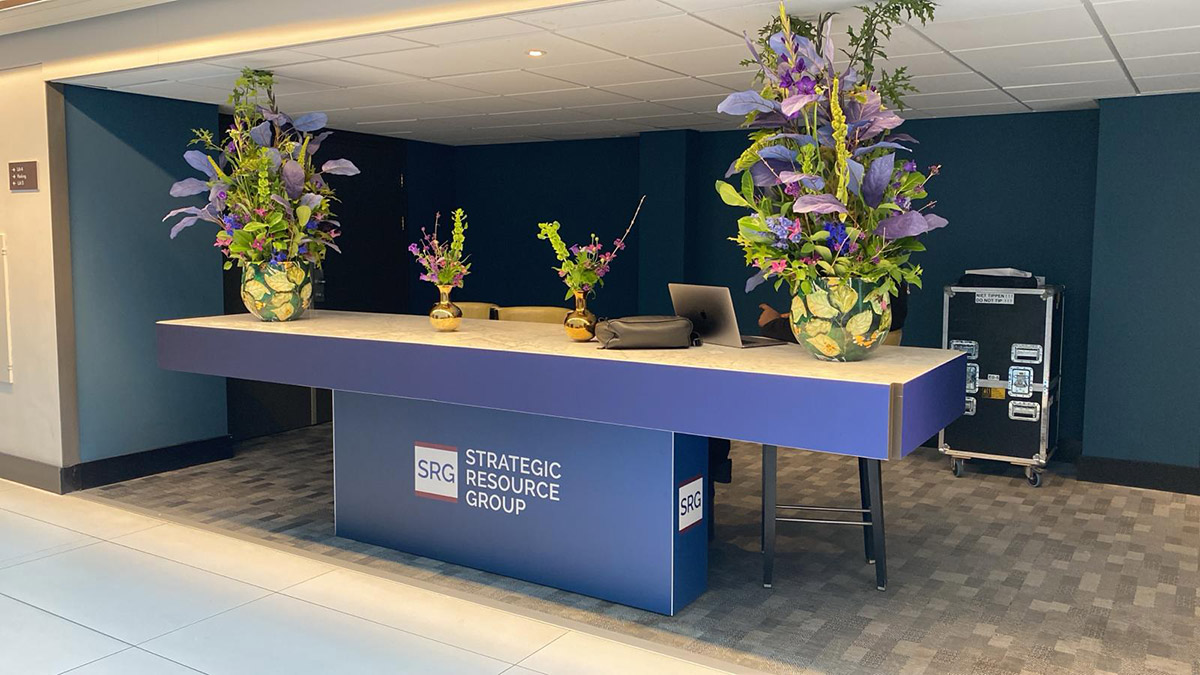 Creates a branded welcome point that leaves a professional first impression and communicates key messages.